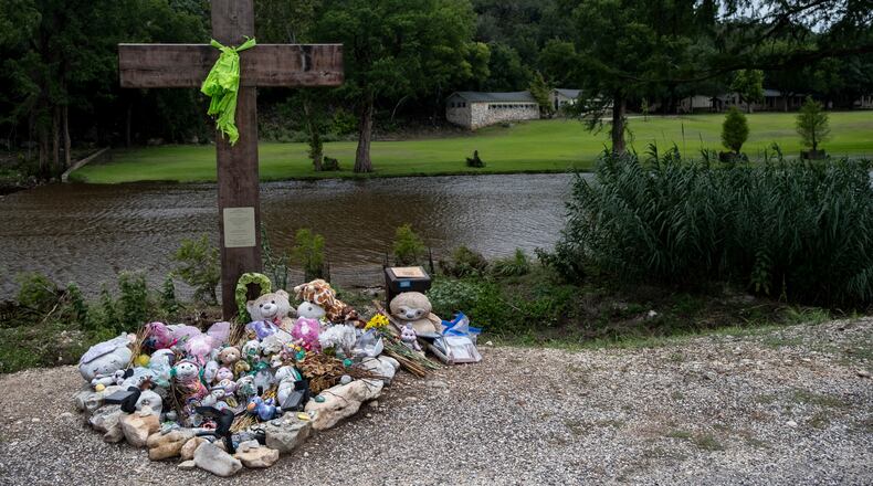 FILE - A memorial for the victims of the 2025 Camp Mystic flood stands, July 17, 2026, in Hunt, Texas. (AP Photo/Joel Angel Juarez, File)