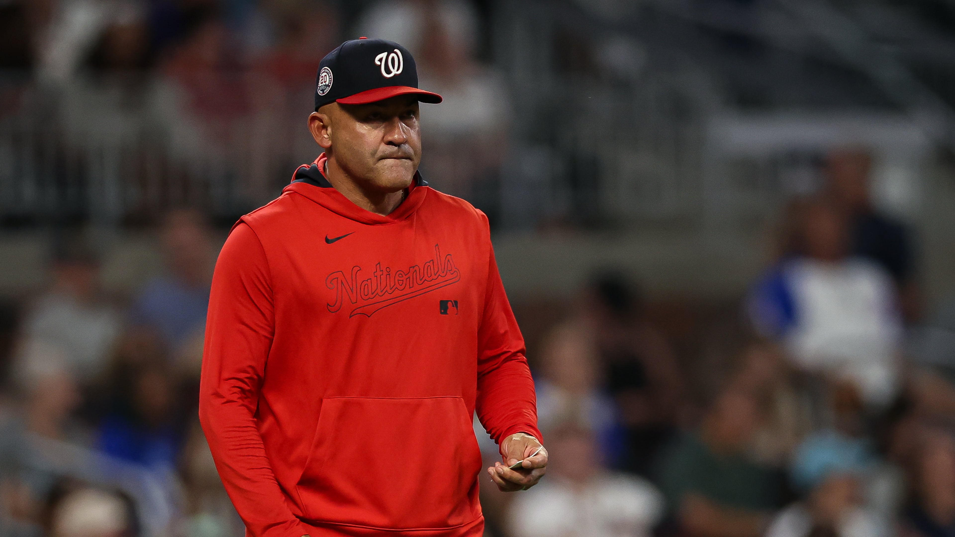 FILE - Washington Nationals interim manager Miguel Cairo walks out to the mound to make a pitching change in the seventh inning of a baseball game against the Atlanta Braves, Tuesday, Sept. 23, 2025, in Atlanta. (AP Photo/Colin Hubbard, File)
