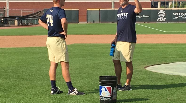 Georgia Tech pitching coach Danny Borrell works with freshman pitcher Brody Wesbrooks after a fall practice on September 17, 2019 at Russ Chandler Stadium. (AJC photo by Ken Sugiura)
