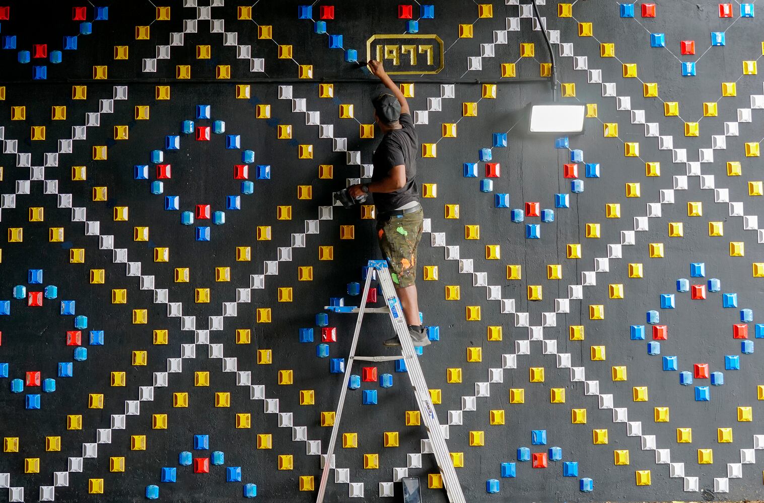 Painters work in an underpass