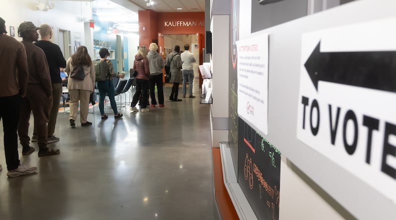 Voters wait in line to cast their ballots at the Don And Mary Ellen Harp Student Center in Atlanta. on Tuesday. The state of Georgia broke voter turnout records as presidential candidates Donald Trump and Kamala Harris went head to head in this swing state. (John Spink/AJC)