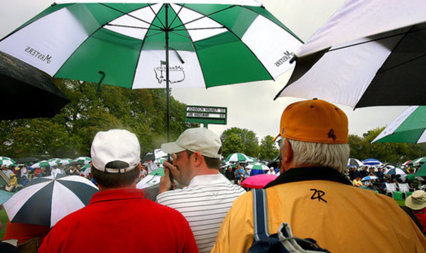 Umbrellas fill Augusta National