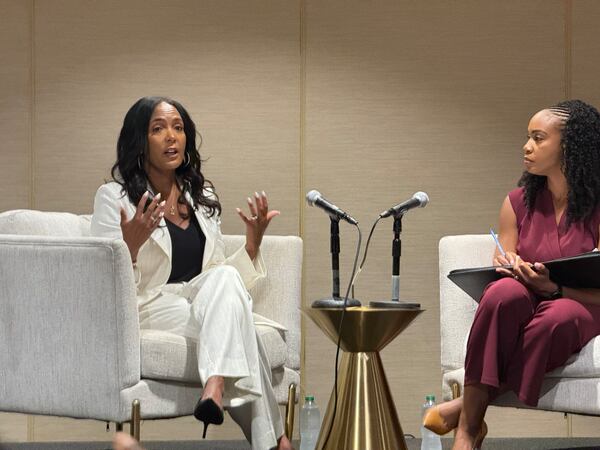 Democratic nominee for governor Keisha Lance Bottoms (left) speaks during the National Association of Black Journalists' convention in Atlanta on Friday, Aug. 14, 2026. (Eric Stirgus/AJC)