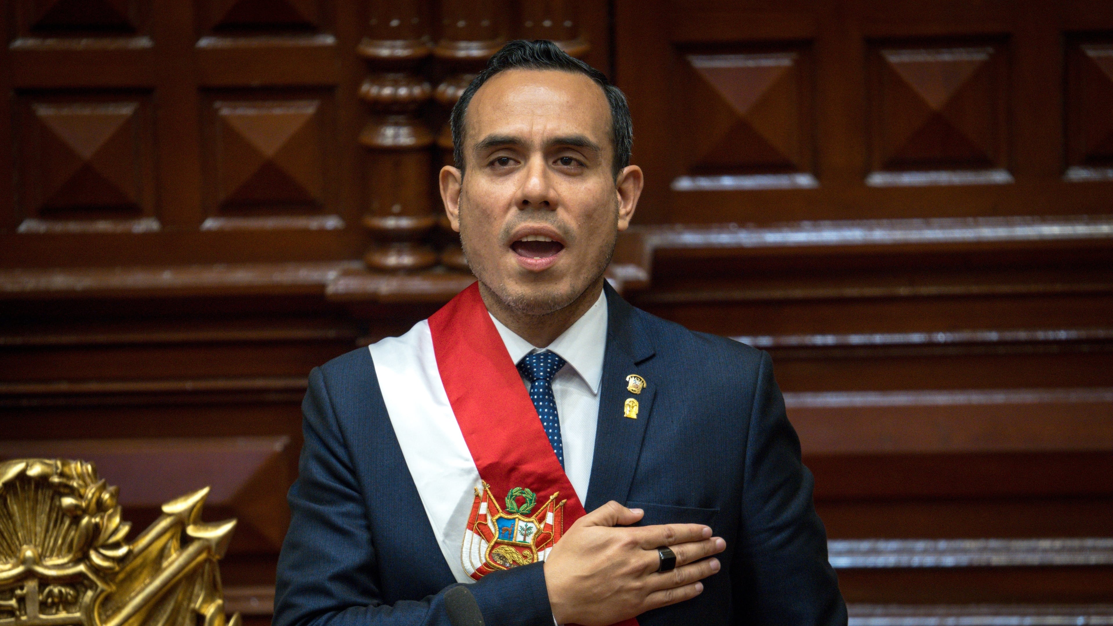 Peru's former president of the Congress Jose Jeri, sings the national anthem after being sworn-in as the interim president in Lima, Peru, Friday, Oct. 10, 2025. (AP Photo/John Reyes)