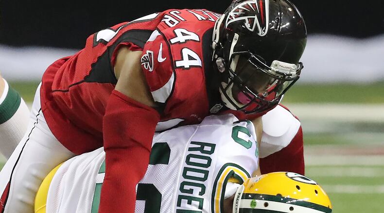 Falcons’ Vic Beasley Jr. sacks Packers’ Aaron Rodgers during the second quarter in an NFL football game on Sunday, Oct. 30, 2016, in Atlanta. Curtis Compton /ccompton@ajc.com