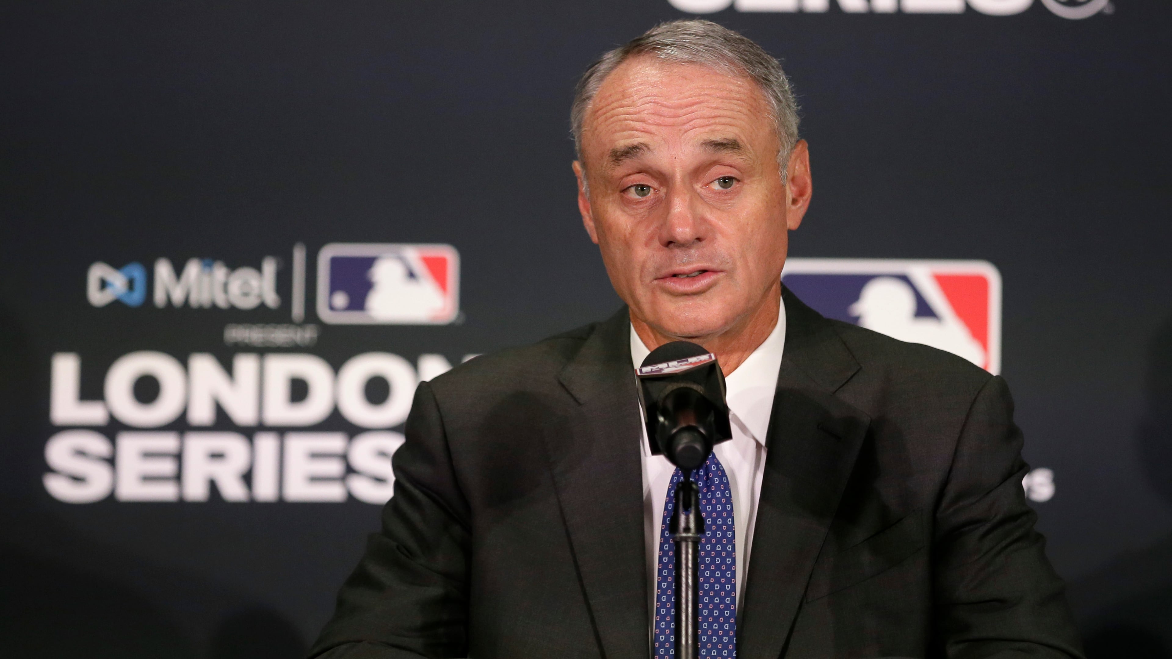 FILE - Major League Baseball commissioner Rob Manfred speaks during a news conference, June 29, 2019, in London. (AP Photo/Tim Ireland, file)