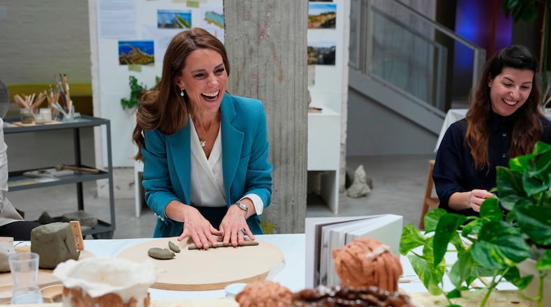 Britain's Kate, Princess of Wales, takes part in an immersive clay atelier workshop at the Loris Malaguzzi International Centre, part of a two-day trip, in Reggio Emilia, Italy, Wednesday, May 13, 2026. (AP Photo/Antonio Calanni, Pool)