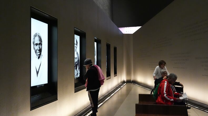 People visit the Smithsonian's National Museum of African American History and Culture, Wednesday, Sept. 23, 2026, in Washington. (AP Photo/Julia Demaree Nikhinson)