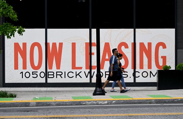 Pedestrians walk past 1050 Brickworks on Tuesday, July 14, 2026, in Atlanta. (Hyosub Shin/AJC)