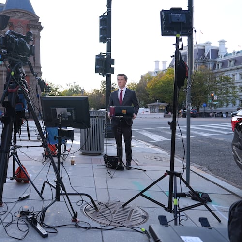 Vaughn Hillyard, White House correspondent for MS NOW, does a report from near the White House,, Monday, Sept. 21, 2026, in Washington. (AP Photo/Mark Schiefelbein)