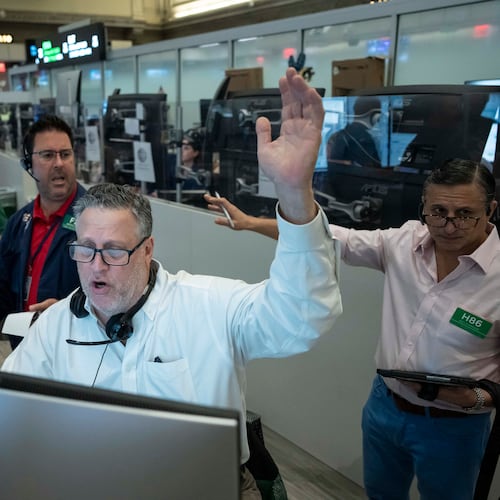 Options trader Marty Handler works on the floor of the New York Stock Exchange, Thursday, Aug. 27, 2026, in New York. (AP Photo/Yuki Iwamura)