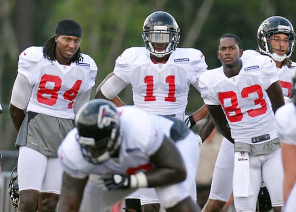 From left, Falcons receivers Roddy White, Julio Jones and Harry Douglas keep an eye on practice during their playing days.
