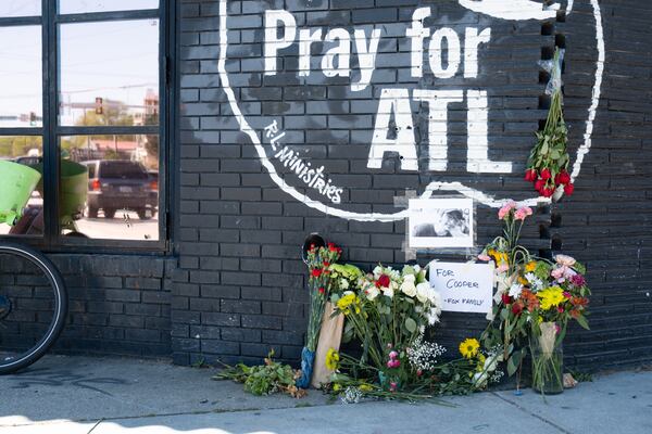 A memorial in Little Five Points near where a Georgia State Patrol chase ended in a crash that killed a 19-year-old bystander.