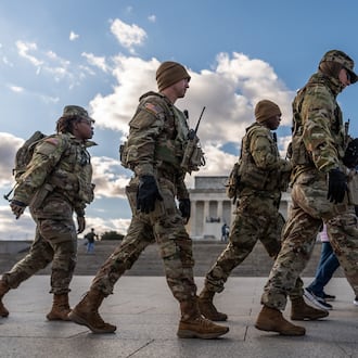 Members of the National Guard patrol in front of the Lincoln Memorial on the National Mall, Friday, Nov. 28, 2025, in Washington. (AP Photo/Julia Demaree Nikhinson)