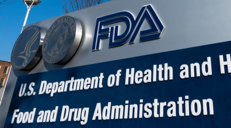 FILE - A sign for the U.S. Food and Drug Administration is displayed outside their offices in Silver Spring, Md., Dec. 10, 2020. (AP Photo/Manuel Balce Ceneta, File)