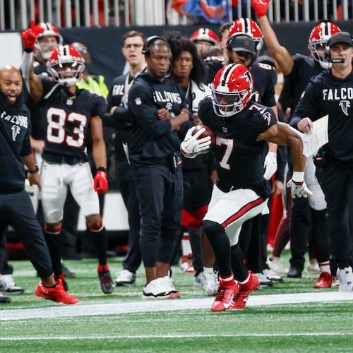 Atlanta Falcons running back Bijan Robinson (7) runs for a touchdown during the first half of an NFL football game against the Buffalo Bills at Mercedes-Benz Stadium in Atlanta on Monday, October 13, 2025. (Miguel Martinez/ AJC)