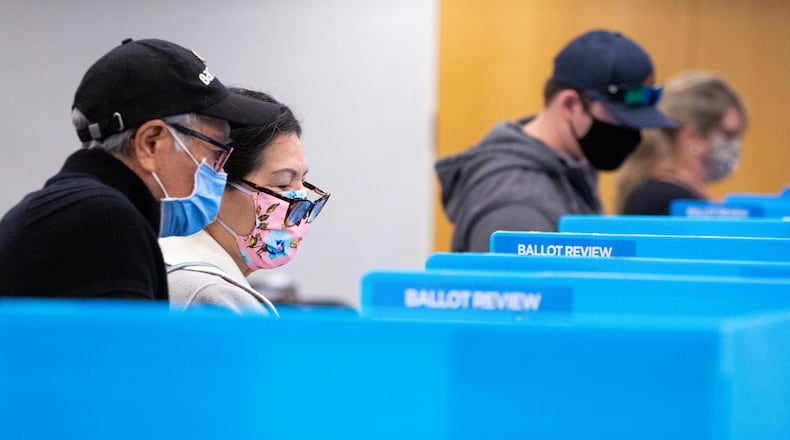 Gwinnett County voters cast ballots on Nov. 3, 2020. State Republicans recently made Gwinnett's school board elections nonpartisan, moving those races from November to May. (Casey Sykes for The Atlanta-Journal Constitution)