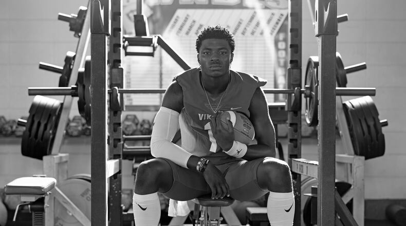 Lowndes County quarterback Jacurri Brown said he’s a little familiar with the AJC’s Super 11. His school celebrated the selection of 2011 Super 11 class member Josh Harvey-Clemons. “Football is life. To be selected as one of the best top football players, all-around, that’s a good feeling right there,” said Brown. (Tyson Alan Horne / Tyson.Horne@ajc.com)