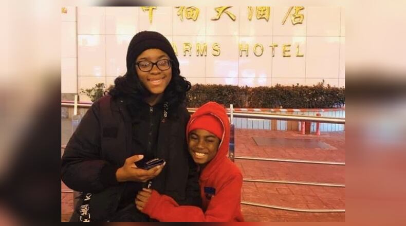 JeNaii Jackson (left) and brother JeKaii are in China with their mother. DaVina Jackson said coming to China was a great experience for her family, but the coronavirus pandemic has changed all that. CONTRIBUTED: DAVINA JACKSON