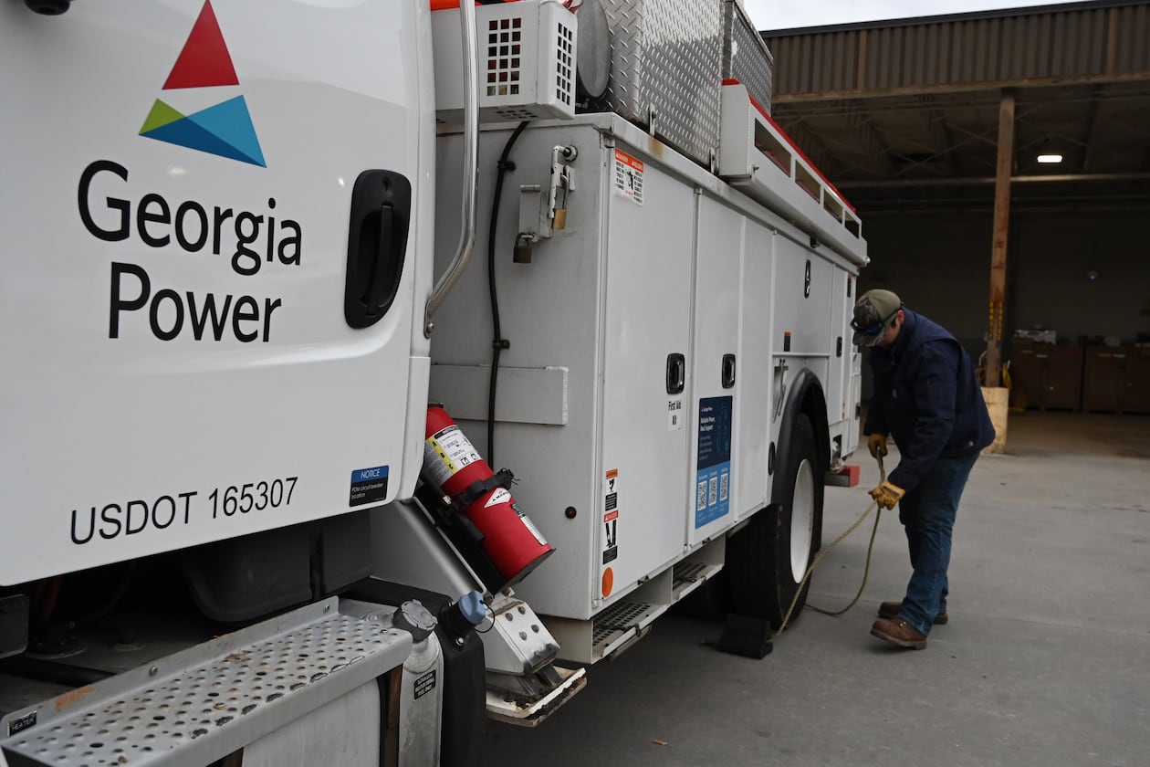 Austin Brown, with Georgia Power, prepares his truck at Georgia Power North Shallowford Operating Headquarters, Saturday, Jan. 24, 2026, in Atlanta. In metro Atlanta, an ice storm warning went into effect at 1 p.m. Saturday. It’s expected to last until Monday morning, the National Weather Service said. (Hyosub Shin/AJC)