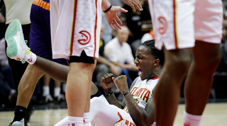 Atlanta Hawks’ Taurean Prince reacts after drawing the foul while scoring a basket in the fourth quarter of an NBA basketball game against the Phoenix Suns in Atlanta, Tuesday, March 28, 2017. Atlanta won 95-91. (AP Photo/David Goldman)