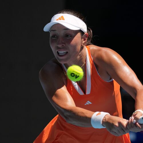 Jessica Pegula of the U.S. plays a backhand return to her compatriot Madison Keys during their fourth round match at the Australian Open tennis championship in Melbourne, Australia, Monday, Jan. 26, 2026. (AP Photo/Mark Baker)
