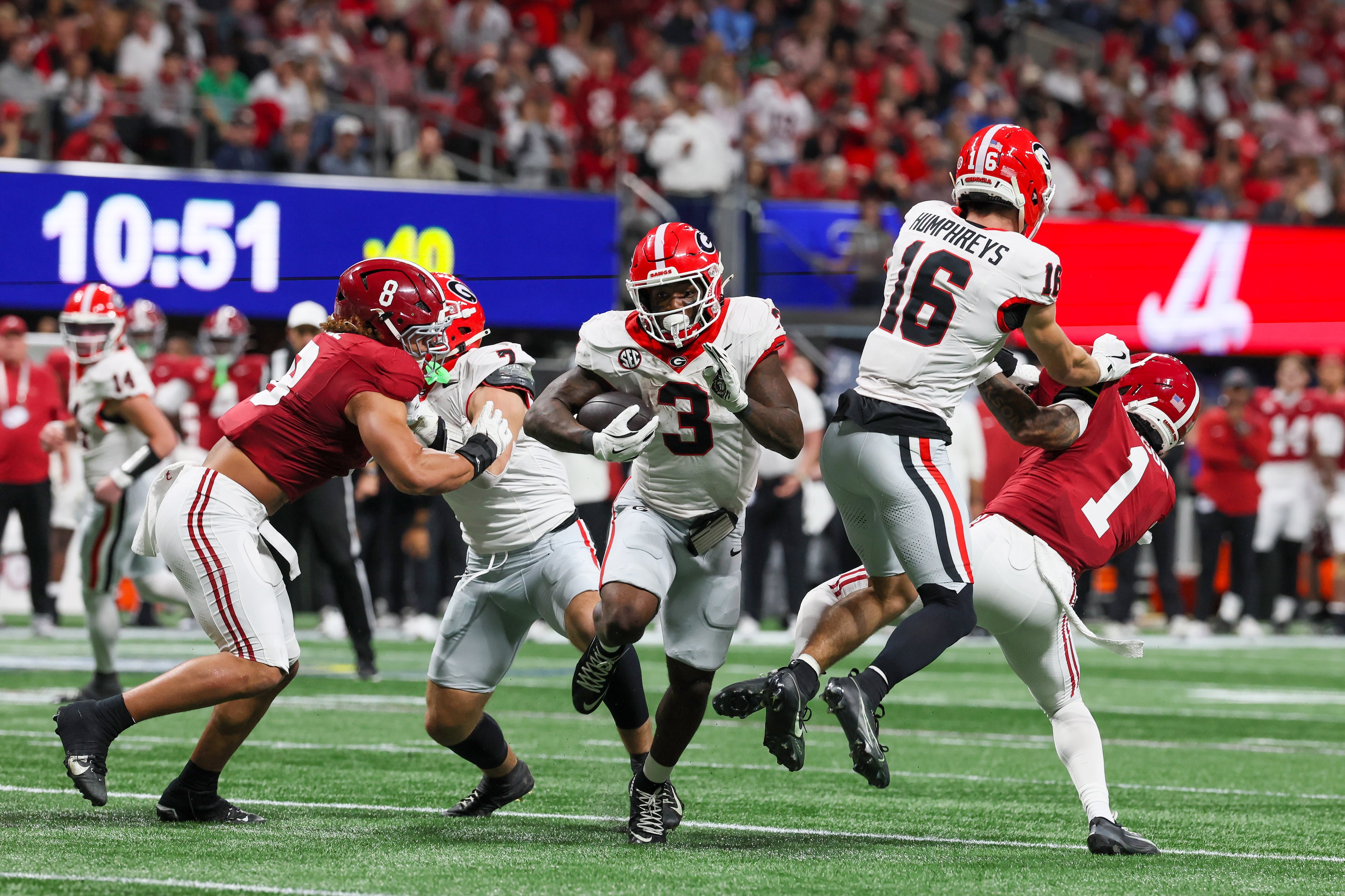Georgia running back Nate Frazier (3) rushes for a nine yard touchdown against Alabama during the third quarter of the SEC Championship game at Mercedes-Benz Stadium, Saturday, Dec. 6, 2025, in Atlanta. (Jason Getz / AJC)