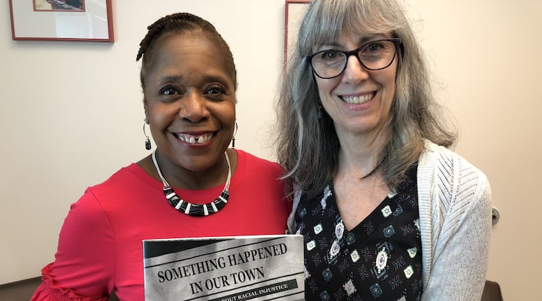 Dr. Marietta Collins and Dr. Marianne Celano, Atlanta child psychologists, worked together, along with Dr. Ann Hazzard, on a new children’s book, “Something Happened in Our Town.” HELENA OLIVIERO / HOLIVIERO@AJC.COM