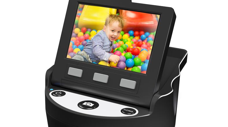 The Kodak Scanza digital film scanner comes with all the adapters and inserts to convert 126, 110, super 8 and 8 mm, 35 mm film negatives and slides to jpeg files. (Handout/TNS)