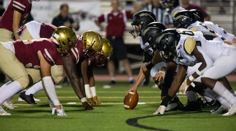 Players line up during a GHSA high school football game between Mountain View and Brookwood at Brookwood High School in Snellville, GA., on Friday, Oct. 1, 2021. (Photo/Jenn Finch)