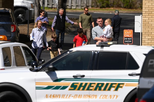 FILE - Families leave a reunification site in Nashville, Tenn., Monday, March 27, 2023 after several children were killed in a shooting at Covenant School in Nashville. The suspect is dead after a confrontation with police. (AP Photo/John Amis, File)