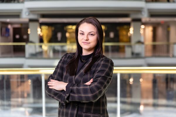 Atlanta Journal-Constitution reporter Riley Bunch poses for a portrait at City Hall in Atlanta on Monday, February 24, 2025. (Arvin Temkar / AJC)