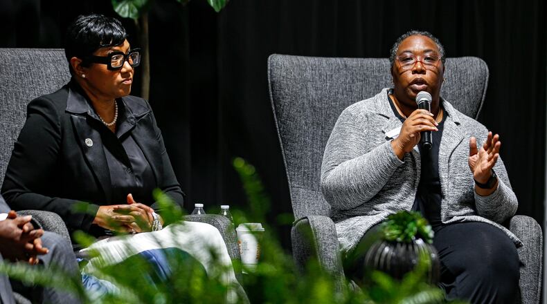Chakira Johnson, (right), speaks at DeKalb CEO & Commission Forum on Housing in Atlanta, Georgia on Thursday, June 13, 2024.   (Ziyu Julian Zhu / AJC)