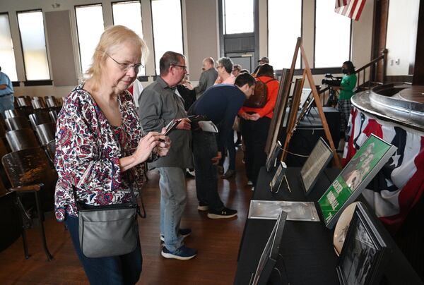 Judy Spillers (left), of Conyers, reads displays during Presidents’ Day event at Plains High School at Jimmy Carter National Historic Park, Monday, Feb. 20, 2023, in Plains, GA. (Hyosub Shin / Hyosub.Shin@ajc.com)