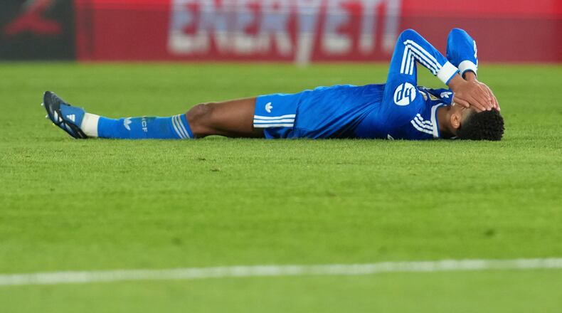 Real Madrid's Jude Bellingham reacts after the Spanish La Liga soccer match between Elche and Real Madrid in Elche, Spain, Sunday, Nov. 23, 2025. (AP Photo/Alberto Saiz)