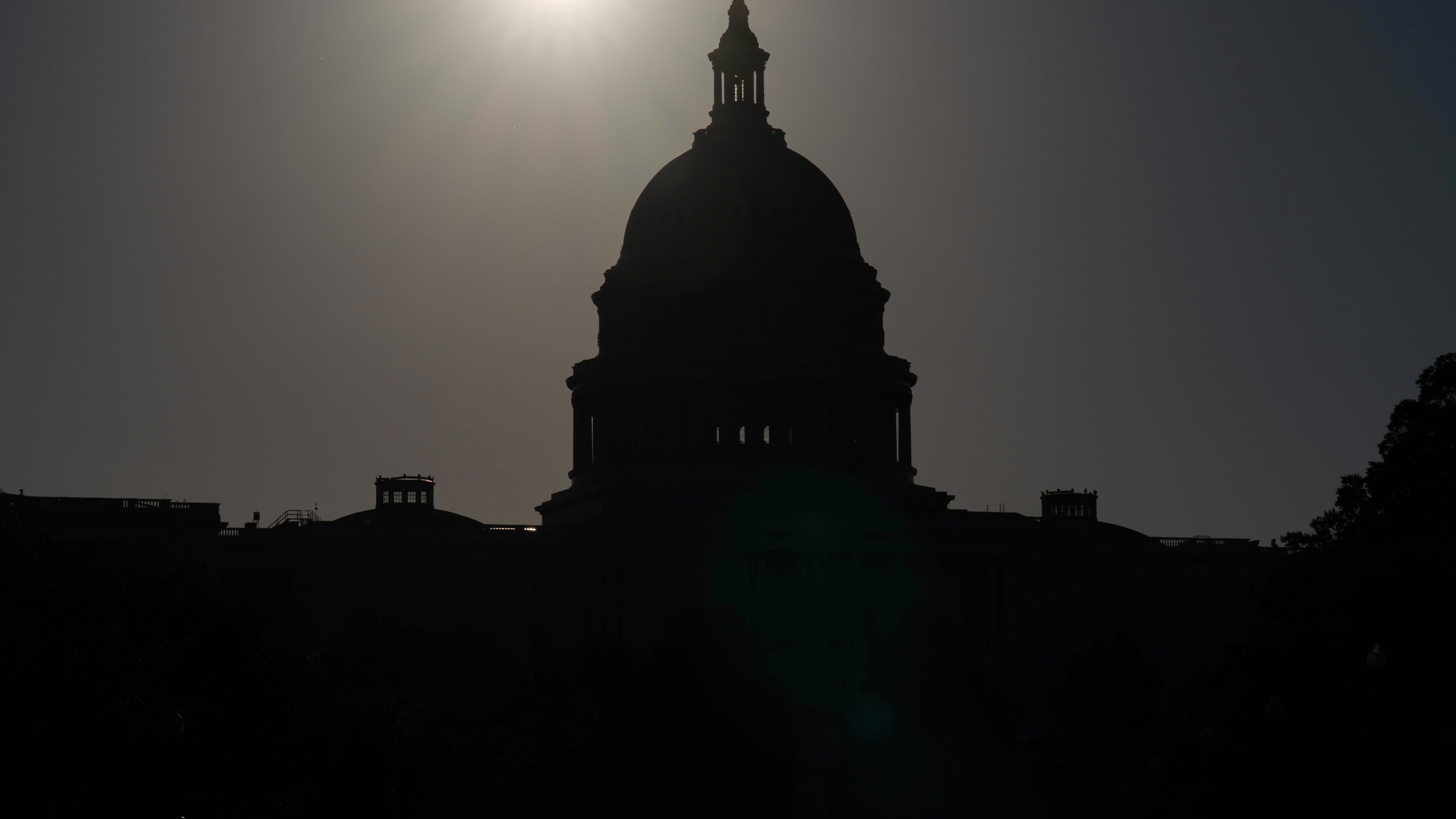 The U.S. Capitol is seen at sunrise on the 6th day of the government shutdown, at the Capitol in Washington, Monday, Oct. 6, 2025. (AP Photo/Jose Luis Magana)