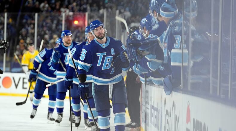 Tampa Bay Lightning right wing Nikita Kucherov (86) celebrates with the bench after his goal against the Boston Bruins during the thirdd period of a Stadium Series NHL hockey game Sunday, Feb. 1, 2026, in Tampa, Fla. (AP Photo/Chris O'Meara)