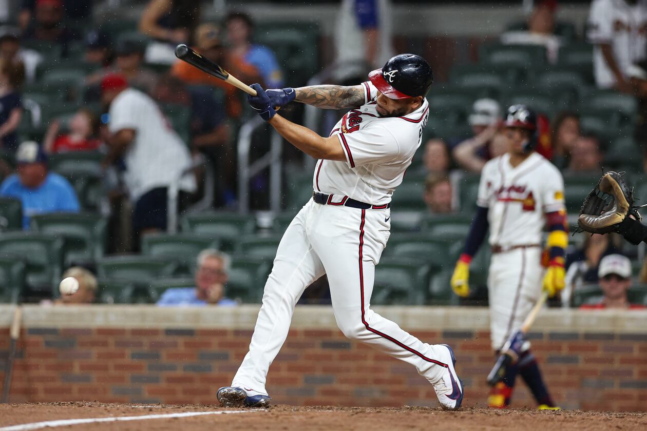 The Braves' Dominic Smith hits an RBI single in the eighth inning Wednesday, July 22, 2026, against the Padres in Atlanta. Smith had a three-run home run in the fourth inning Thursday that gave the Braves a 5-3 lead en route to their 6-5 victory. (Colin Hubbard/AP)