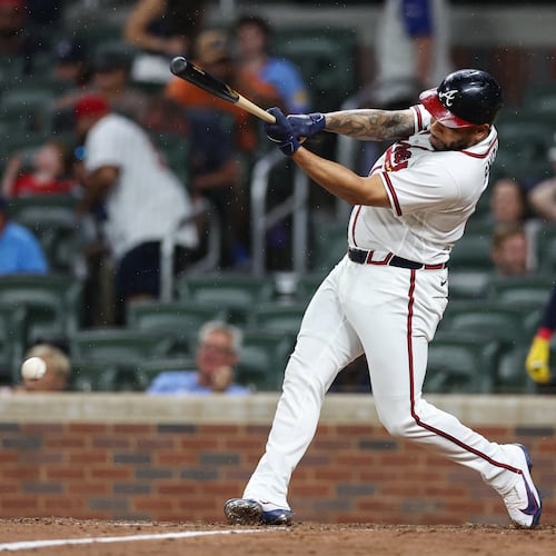 The Braves' Dominic Smith hits an RBI single in the eighth inning Wednesday, July 22, 2026, against the Padres in Atlanta. Smith had a three-run home run in the fourth inning Thursday that gave the Braves a 5-3 lead en route to their 6-5 victory. (Colin Hubbard/AP)