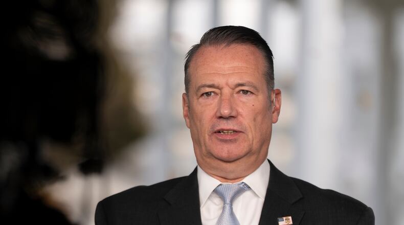 FILE - Todd Lyons, acting director of the U.S. Immigration and Customs. Enforcement (ICE), speaks during a television interview the White House Nov. 3, 2025 in Washington. (AP Photo/Manuel Balce Ceneta, File)