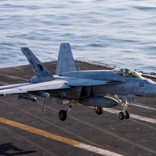 This image provided by U.S. Central Command shows a F/A-18E Super Hornet coming in for an arrested landing on USS Abraham Lincoln (CVN 72) after flying in support of Operation Epic Fury, on Saturday, Feb. 28, 2026. (U.S. Navy via AP)