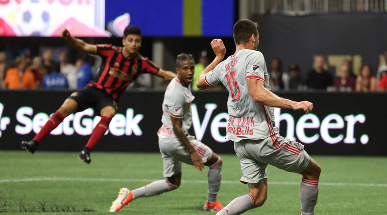 New York Red Bulls defender Sean Nealis (15) controls the ball during the first half in a MLS game against The Atlanta United on Sunday, July 7, 2019, in Atlanta. Branden Camp/SPECIAL