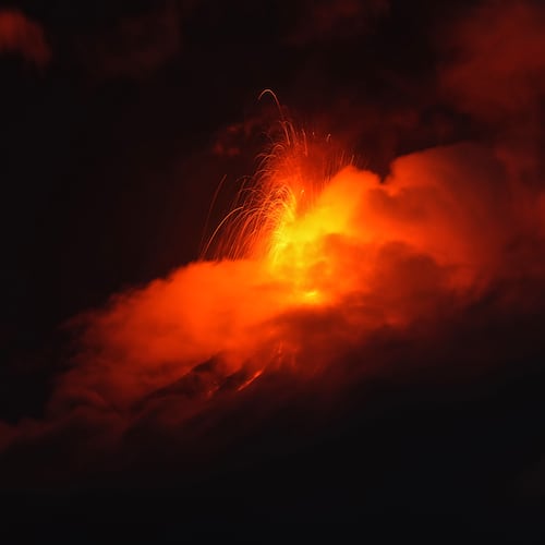 Lava flows out of the crater of the Fuego Volcano, as seen from San Juan Alotenango, Guatemala, Tuesday, Aug. 4, 2026. (AP Photo/Moises Castillo)