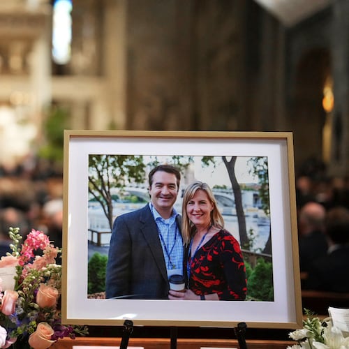 FILE - A photo of Mark and Melissa Hortman is displayed during their funeral service inside the sanctuary at the Basilica of St. Mary's in Minneapolis on June 28, 2025. (Alex Kormann/Star Tribune via AP, Pool, File)