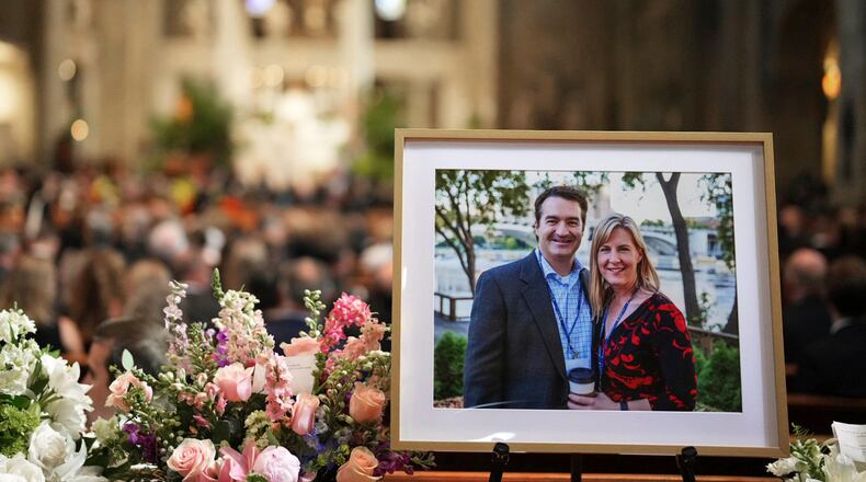 FILE - A photo of Mark and Melissa Hortman is displayed during their funeral service inside the sanctuary at the Basilica of St. Mary's in Minneapolis on June 28, 2025. (Alex Kormann/Star Tribune via AP, Pool, File)