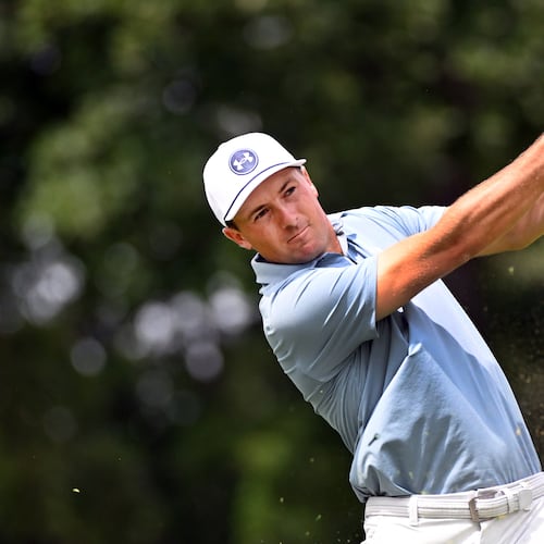 Jordan Spieth hits from the ninth tee during the first round of the Rocket Classic golf tournament at the Detroit Golf Club, Thursday, July 30, 2026, in Detroit. (AP Photo/Jose Juarez)
