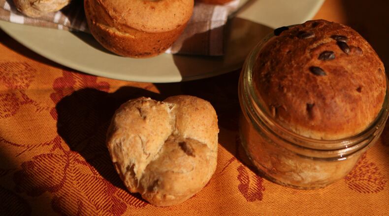 Whole Grain Rolls, Popovers, Fresh Herb Rolls, and Corn Muffins with Roasted Garlic and Sage.