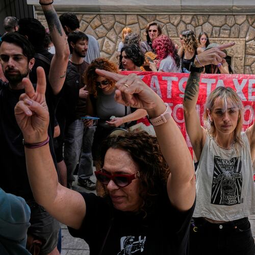 Protesters chant pro-Palestinian slogans outside Greece's Foreign Ministry after Israel's navy intercepted an activist flotilla in waters off of Cyprus, in Athens, Tuesday, May 19, 2026. (AP Photo/Thanassis Stavrakis)