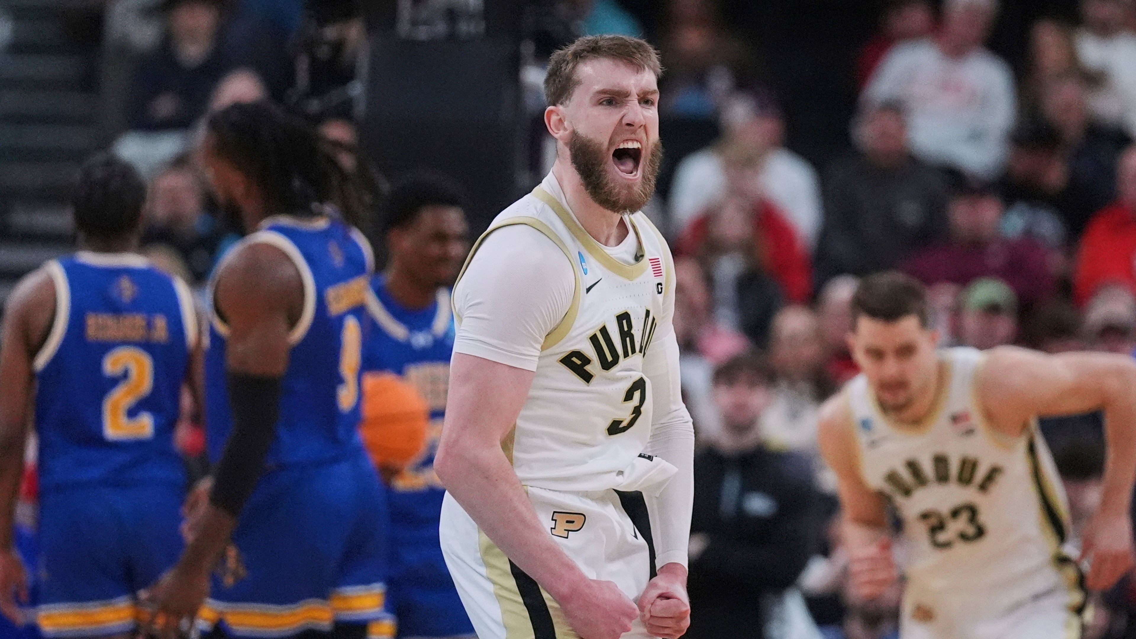 FILE - Purdue guard Braden Smith (3) celebrates while taking a lead against McNeese State during the first half in the second round of the NCAA college basketball tournament, Saturday, March 22, 2025, in Providence, R.I. (AP Photo/Charles Krupa, File)