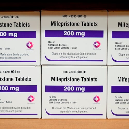 FILE - Boxes of the drug mifepristone sit on a shelf at the West Alabama Women's Center in Tuscaloosa, Ala., March 16, 2022. (AP Photo/Allen G. Breed, File)